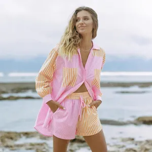 Women's pink orange striped button-up shirt and matching shorts loungewear set main view.