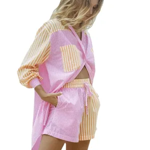 Women's striped shirt and shorts set casual button down oversized two piece outfit.