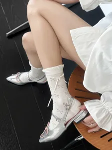 Ballet-core sheer ribbon bow socks for women, breathable cotton blend, chic fashion hosiery.