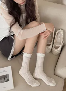 Knit hollow-out floral mid-calf socks for women, sweet college style breathable hosiery.