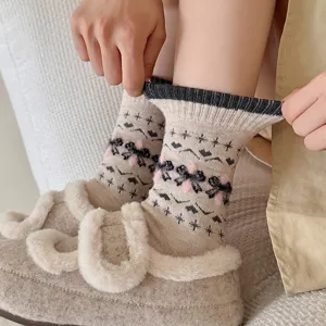 Women winter warm fleece mid-tube socks with cute bowknot design for cozy home wear detail shot