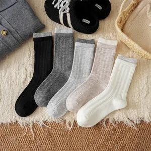 Thickened ribbed wool socks detail showing soft texture and contrasting cuffs in five cozy colors.