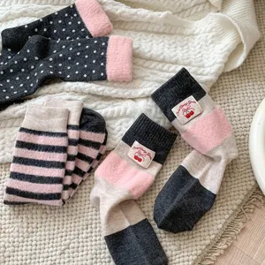 Cozy fleece-lined thermal mid-tube socks for women winter warm polka dot and striped design.