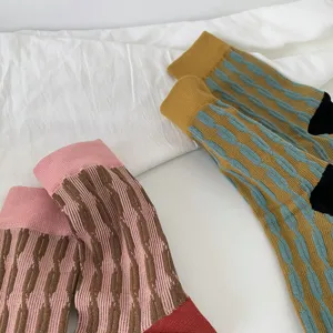 Women cotton crew socks, vintage color block cable knit pattern, soft breathable fabric detail.