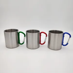 Stainless steel camping mug with carabiner handle, portable outdoor coffee cup for travel.