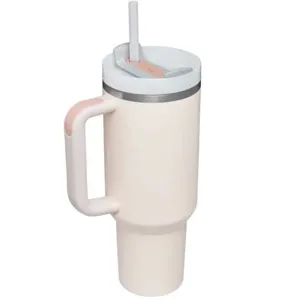 Detailed view of the 40oz stainless steel insulated tumbler with a convenient handle and straw.