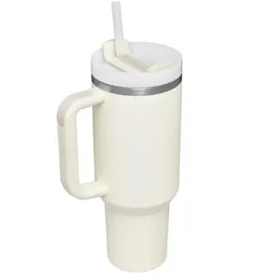 Detail view of 40oz insulated tumbler with handle and straw, cream white stainless steel.