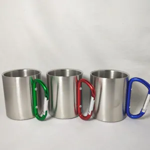 Stainless steel camping mug with carabiner handle, portable outdoor coffee cup for travel.