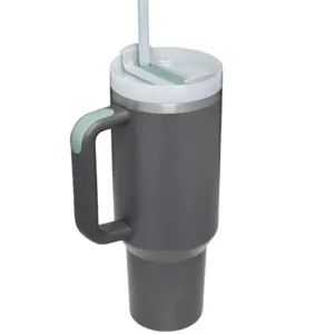 Detailed view of the 40oz insulated stainless steel tumbler with ergonomic handle and straw.