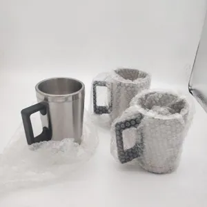 Stainless steel car headlight restoration atomization cup with protective bubble wrap.