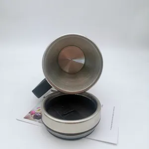 Stainless steel car heating travel mug interior and lid detail view for vehicle use