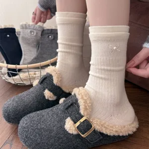 Cozy women's crew socks featuring delicate pearl bow embroidery, soft knit daily wear winter socks.