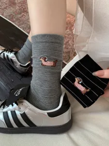 Cute dachshund embroidered mid tube socks for women featuring stylish fine stripes and cotton.