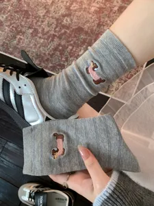 Grey striped mid-calf socks for women featuring cute embroidered dachshund design, pure cotton.