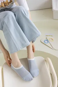 Detailed view of summer cotton low-cut invisible socks with colorblock design for women.