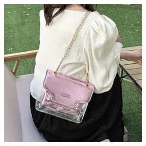 Transparent pink chain crossbody bag detail view, stylish metallic finish fashion purse.