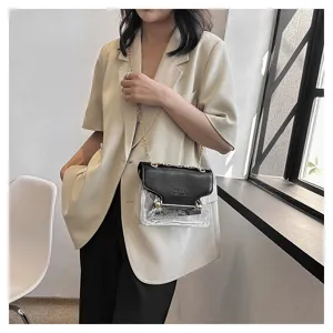 Clear PVC shoulder bag detail, stylish contrast color chain design, modern fashion accessory.