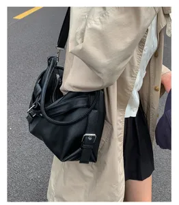 Stylish black leather motorcycle shoulder bag for women, retro casual crossbody tote handbag.