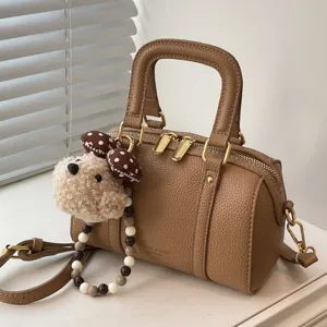 Retro litschi Textur PU Leder Kissen Handtasche Umhängetasche mit süßem Hundehänger.