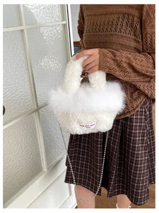 Chic fluffy plush handbag for women with elegant pearl chain strap cozy winter crossbody bag