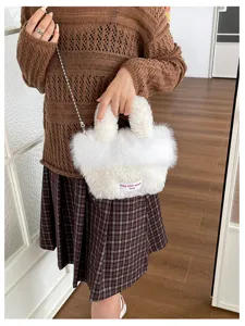 Fluffy white handbag for women, cute plush crossbody bag with chain strap and top handle.