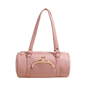 Pink litchi leather cylinder handbag with metal kiss lock and elegant double shoulder straps.