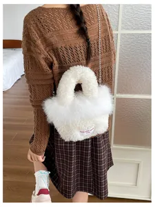 Fluffy white faux fur crossbody bag for women, stylish winter plush handbag with chain strap.
