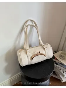 Stylish white cylindrical handbag with double straps and metal kiss-lock closure for women.