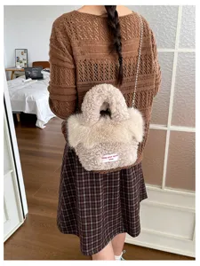Detailed view of women's fluffy plush chain crossbody handbag, stylish and unique fuzzy design.