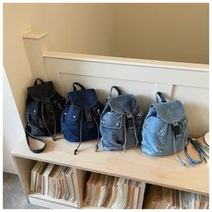 Sac à dos en jean décontracté pour femme, grand format sac d'école élégant, tissu durable.