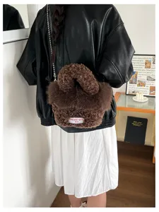Chic brown fuzzy plush crossbody bag for women, trendy fluffy chain handbag and shoulder bag.
