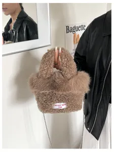 Fluffy plush chain crossbody bag for women, stylish faux shearling handbag for daily wear.