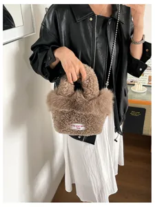 Chic fuzzy plush handbag for women, trendy faux shearling crossbody bag with chain.