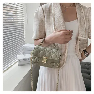 Stylish quilted chain shoulder bag for women, chic crossbody bag with elegant metal lock.