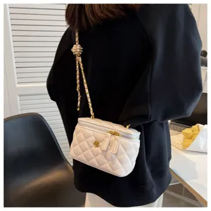 White quilted chain shoulder bag for women, stylish crossbody vanity box bag with chic details.