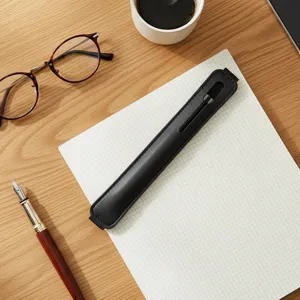 Black leather elastic pen holder pouch sleeve for notebook journal tablet stylus pen storage.