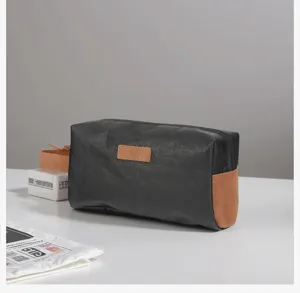 Bolsa de maquillaje impermeable de papel DuPont, neceser de viaje versátil y útil.