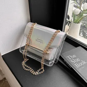 Clear holographic shoulder bag with gold chain stylish transparent crossbody handbag main view.