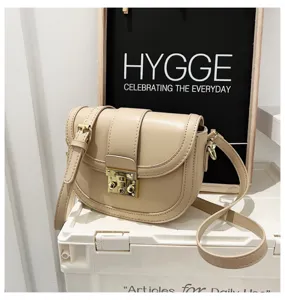Women fashion PU leather saddle bag, stylish solid color shoulder crossbody bag for daily use.