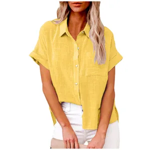 Yellow linen blend short sleeve shirt detail, lapel collar and single-breasted button front.