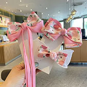 Cute pink bow hair clips detail view, sweet princess hair accessories for girls daily wear.