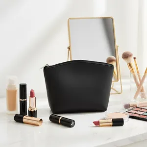 Bolsa de maquillaje negra de piel PU con forma de bola, organizador elegante con cremallera.
