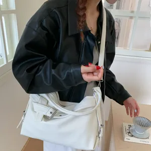 Retro faux leather motorcycle shoulder bag for women, slouchy crossbody tote with buckle.