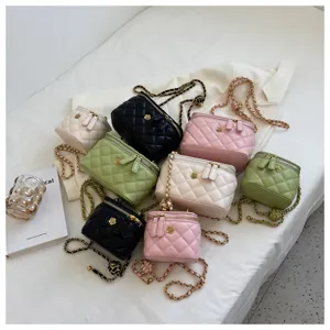 Quilted chain vanity bag set showcasing multiple colors, PU leather crossbody handbag detail.