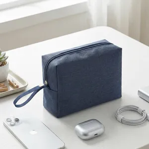 Bolsa de aseo de viaje portatil neceser impermeable para cosmeticos y accesorios diarios.
