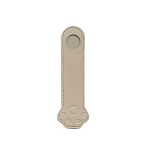 Minimalist PU leather pen sleeve with cute animal paw design, ideal for journals.