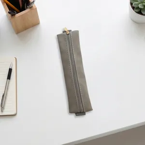 Sleek gray PU leather pencil pouch with zipper, perfect for notebooks and daily stationery storage.