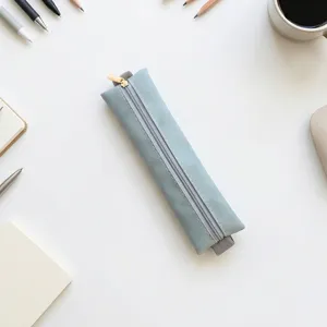 Slim PU leather pencil case with zipper and elastic band for notebook diary stationery storage.