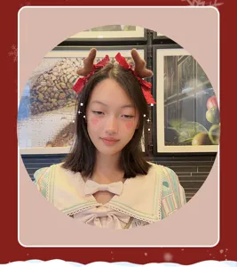 Christmas reindeer antler headband with red ruffles, perfect for holiday festive dress up.