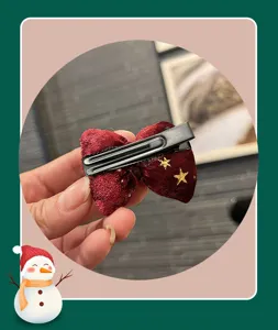 Weihnachts Samt Schleife Haarklammer für Mädchen, rotes Haaraccessoire mit goldenen Sternen.